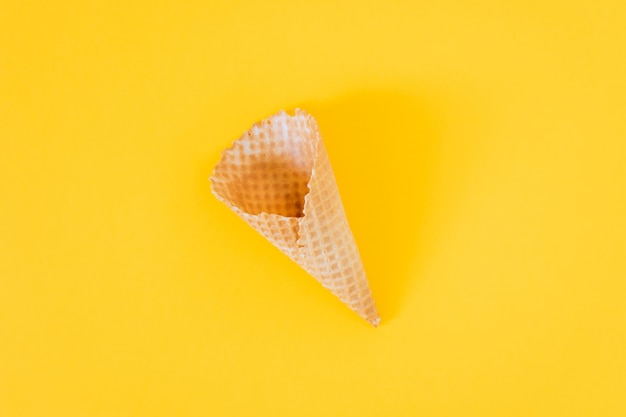 Ice Cream Cone on yellow, flat lay, minimalism