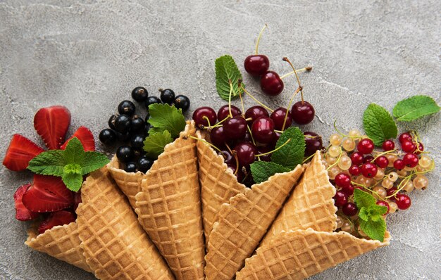 Ice cream cones with berries