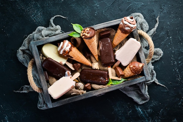 Ice cream A large selection of ice cream On a stone background Top view Free copy space