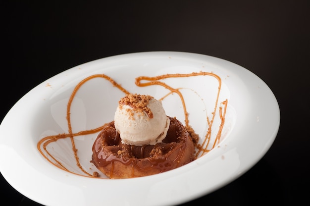 Ice cream in a round white plate