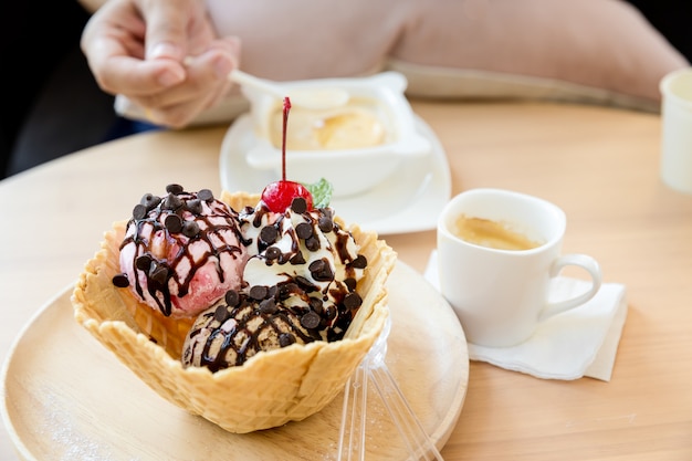 Ice cream scoops with waffle bowl