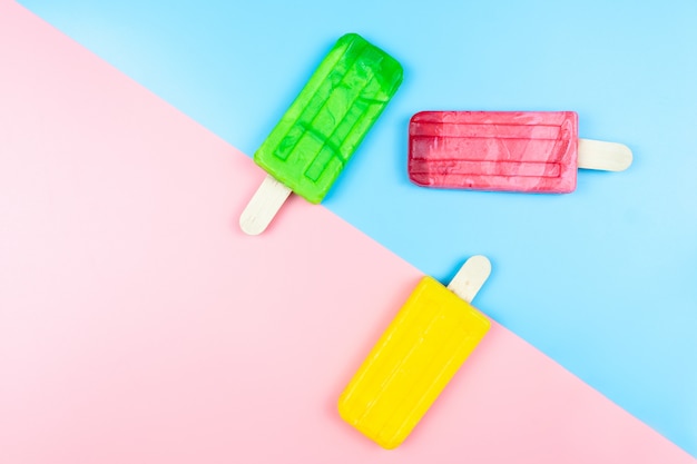 Photo ice cream stick on color background