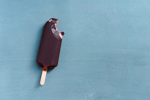 Ice cream stick on dark