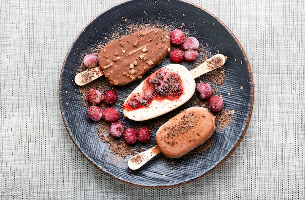 Ice cream on sticks with chocolate.Delicious popsicles covered with chocolate