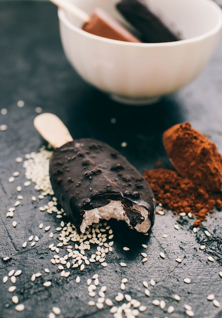 Ice cream with dark chocolate on a dark  