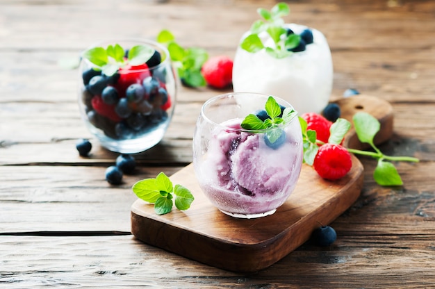 Ice cream with fresh berries and mint