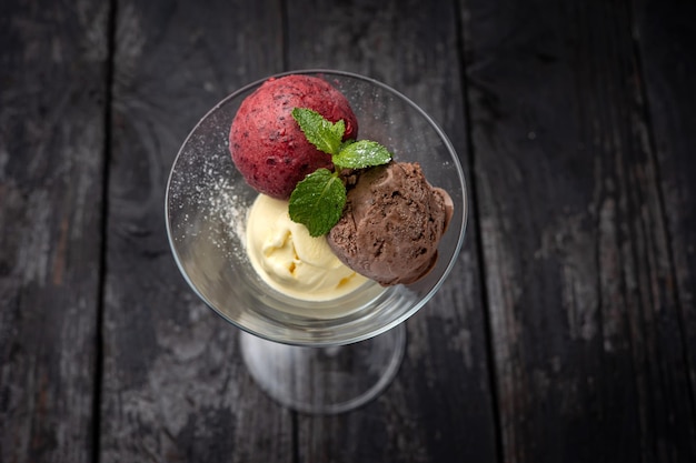 ice cream with mint on a dark background.