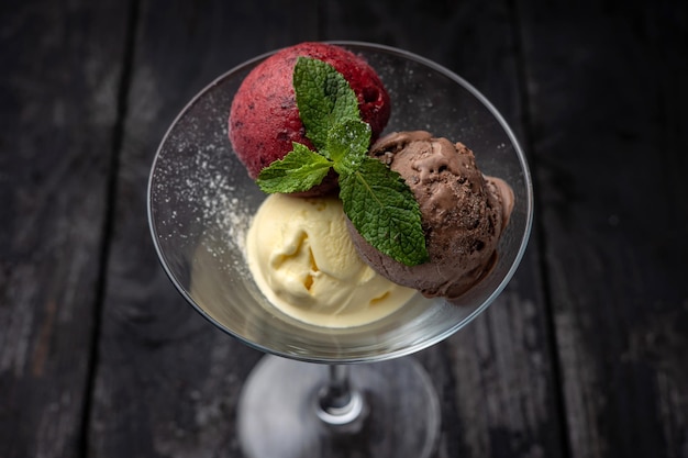 ice cream with mint on a dark background.