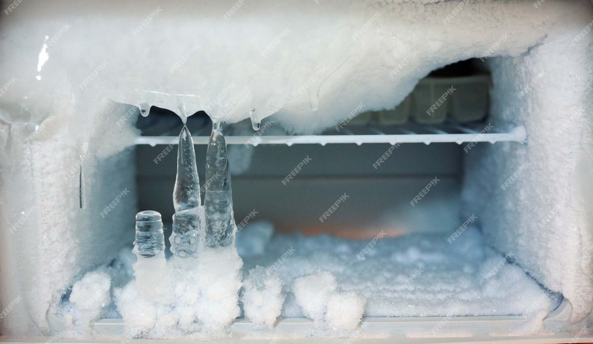 Premium Photo  Ice crystals icebox freezer in refrigerator