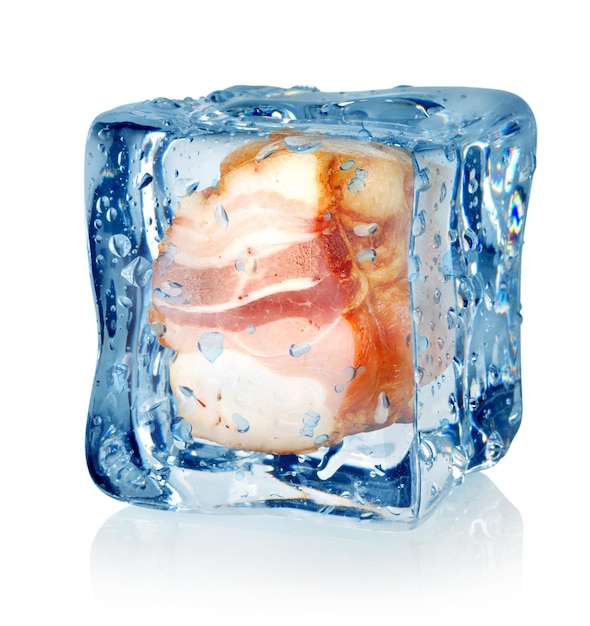 Photo ice cube and fat bacon isolated on a white background