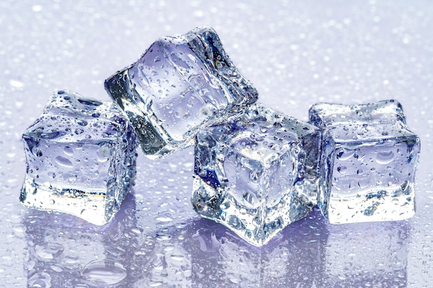 Ice cubes on blue background