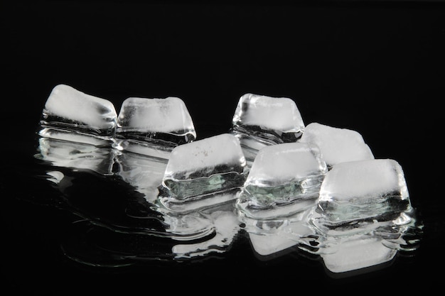 Ice cubes isolated on black background