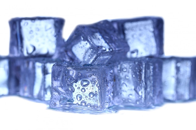 Ice cubes on white wall.