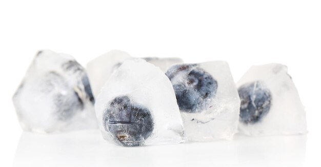 Ice cubes with blueberry isolated on white