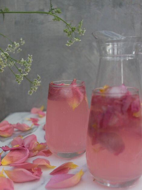 ice cubes with flowers in a glass