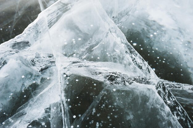 Ice on the frozen lake. Macro image, selective focus