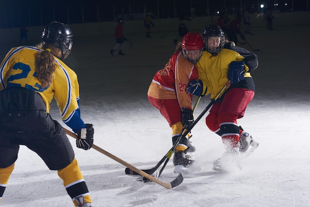 ice hockey sport players in action, business comptetition concpet, teen girls on training