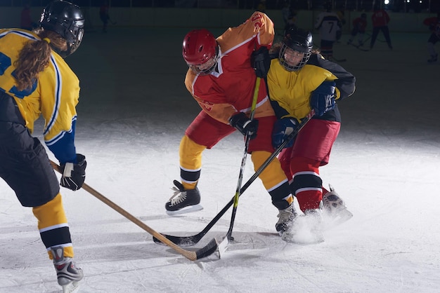 ice hockey sport players in action, business comptetition concpet, teen girls on training