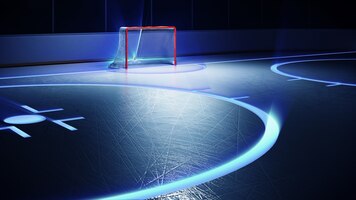 Ice hockey stadium with spotlights and red goal