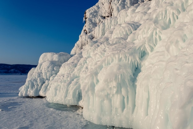 Ice and icicles on rocks on Lake Baikal