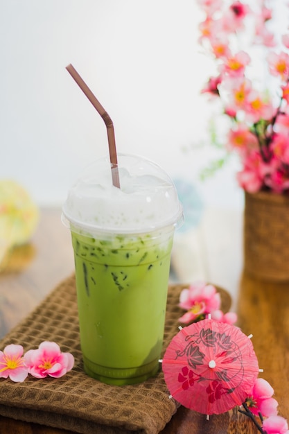 ice milk green tea on table 