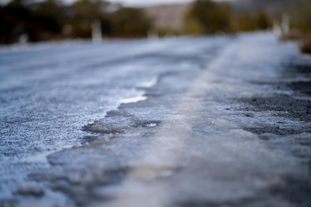 Ice on the road on a mountain in winter