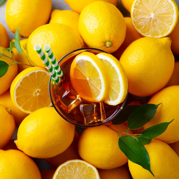 Ice tea with fresh lemons Grey background Close up Top view