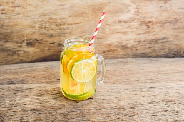 Ice tea with slice of lemon in mason jar