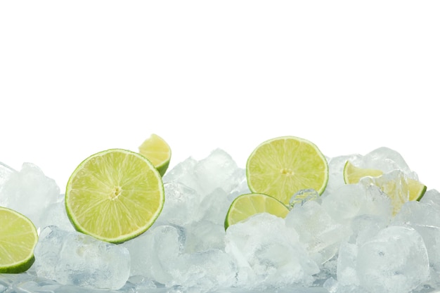 Photo ice with limes isolated on white background