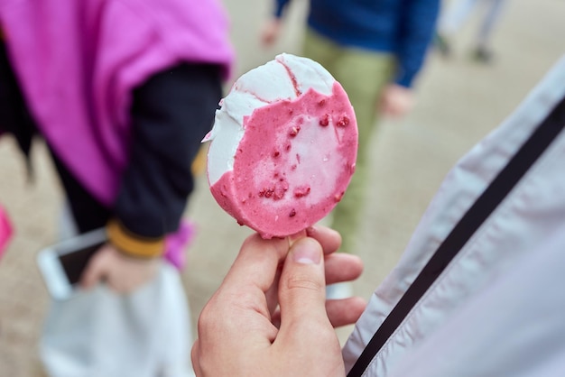 Icecream in child's hands refreshing dessert summer time tasty food