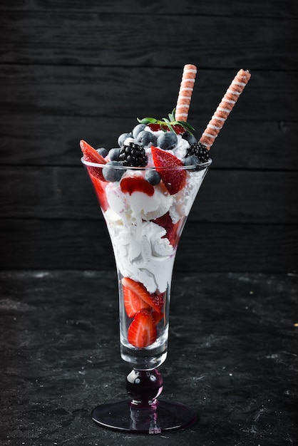 icecream with wild berries dessert top view