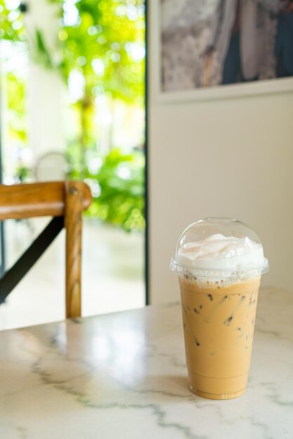 Iced cappuccino coffee glass on table