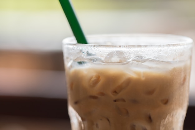 Iced chocolate on outdoor wood desk background