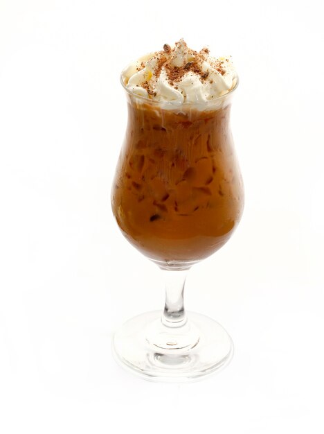 Iced coffee in glass with whipped cream isolated