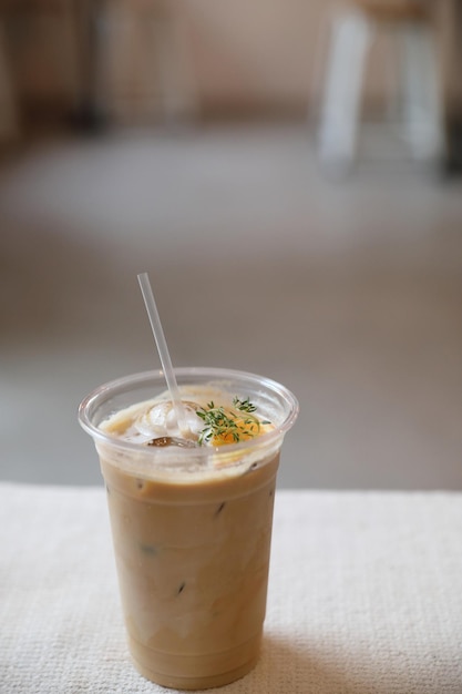 Iced Coffee latte with orange mix in close up