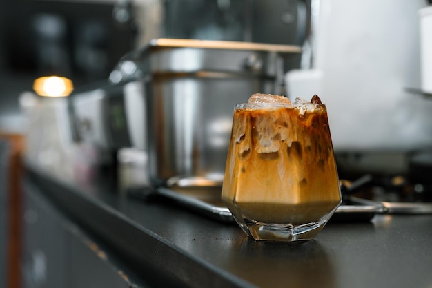 iced coffee served on the black table at cafe