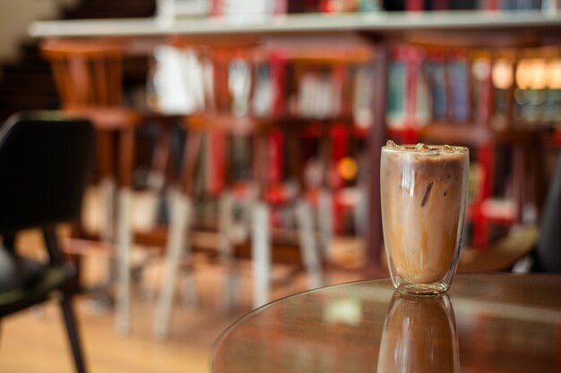 iced coffee on the table inside the cafe