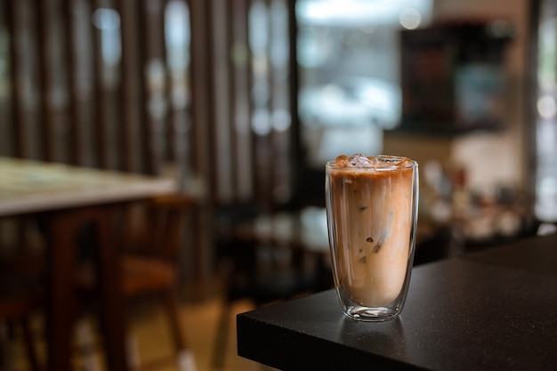 iced coffee on the table inside the cafe