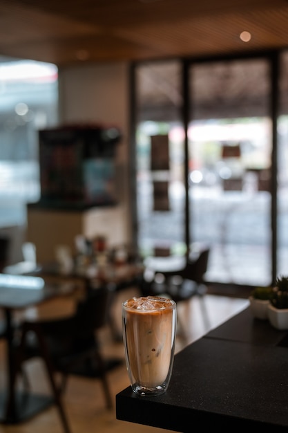 iced coffee on the table inside the cafe