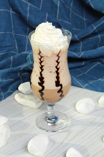 Iced coffee with milk Iced coffee latte  Woman holding glass cup of iced coffee