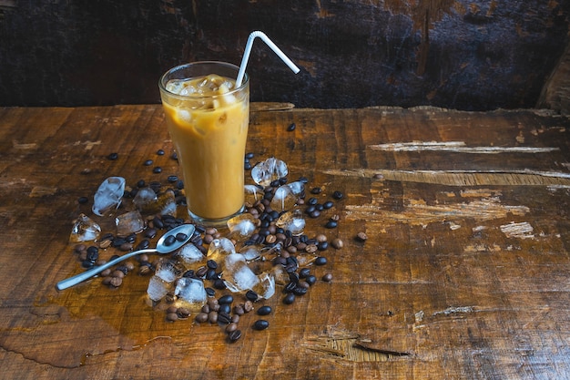 Iced coffee on wooden table