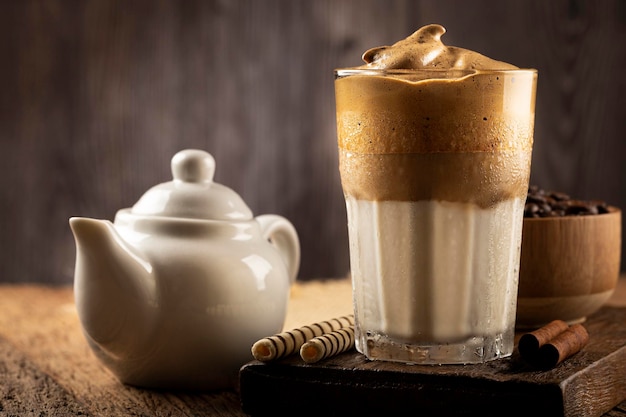 Iced Dalgona Coffee glass with milk and coffee cream