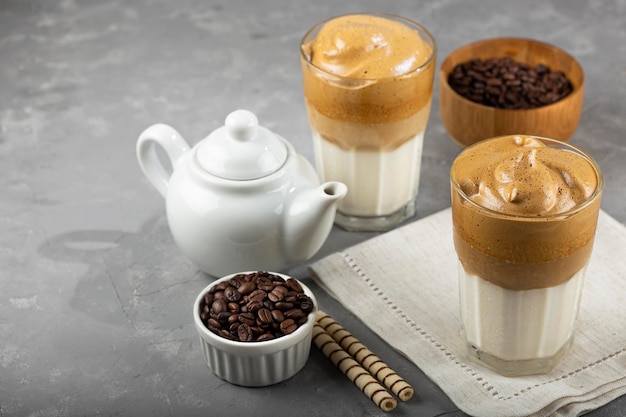 Iced Dalgona Coffee, glass with milk and coffee cream.