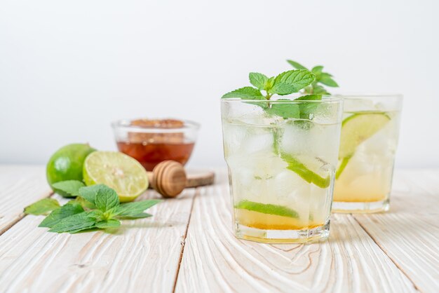 iced honey and lime soda with mint - refreshing drink