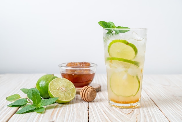 iced honey and lime soda with mint - refreshing drink