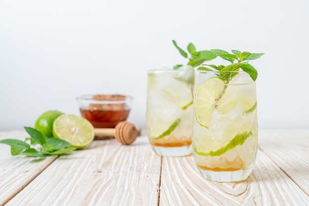 iced honey and lime soda with mint - refreshing drink