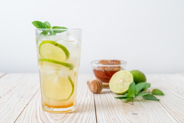 iced honey and lime soda with mint - refreshing drink