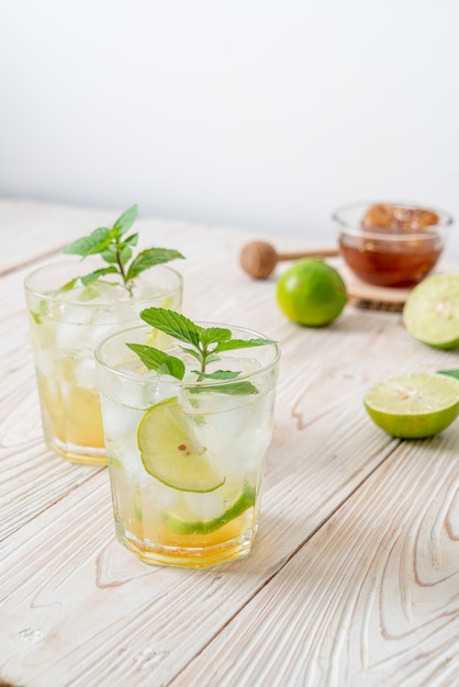 iced honey and lime soda with mint - refreshing drink