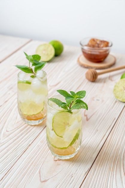 iced honey and lime soda with mint - refreshing drink