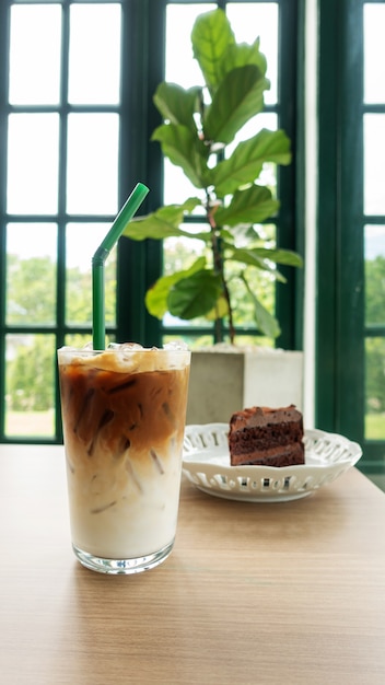 Iced latte coffee and chocolate cake.